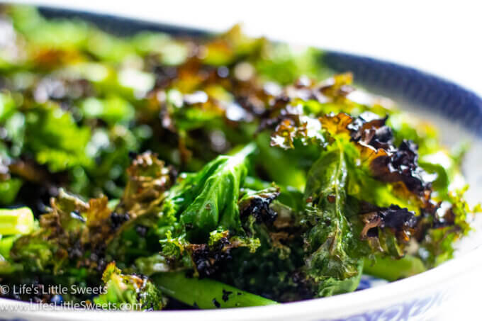 grilled kale on a blue and white serving platter