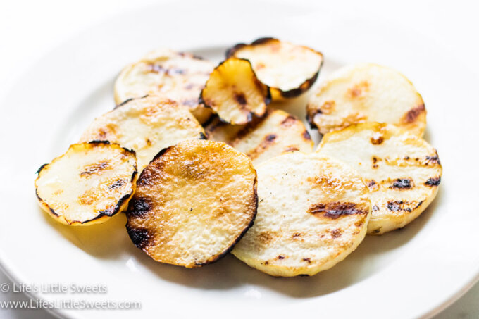 grilled kohlrabi on a white plate in a horizontal photo