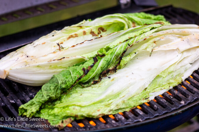Napa cabbage being grilled on a gas grill