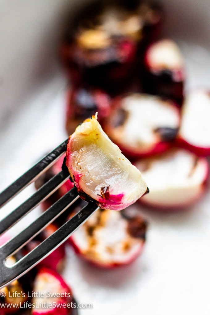 a grilled red radish on a fork