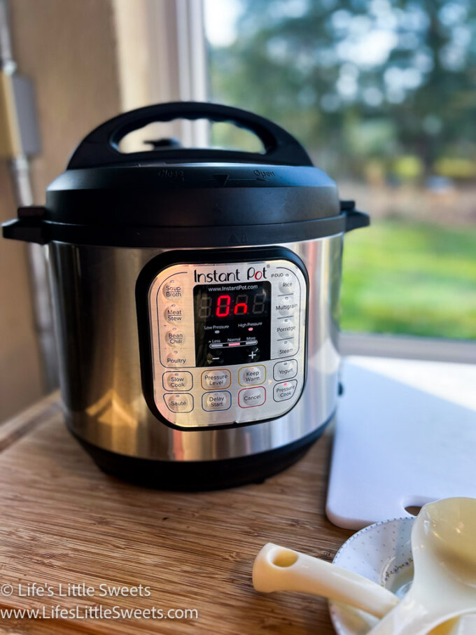 an Instant Pot on a wood table