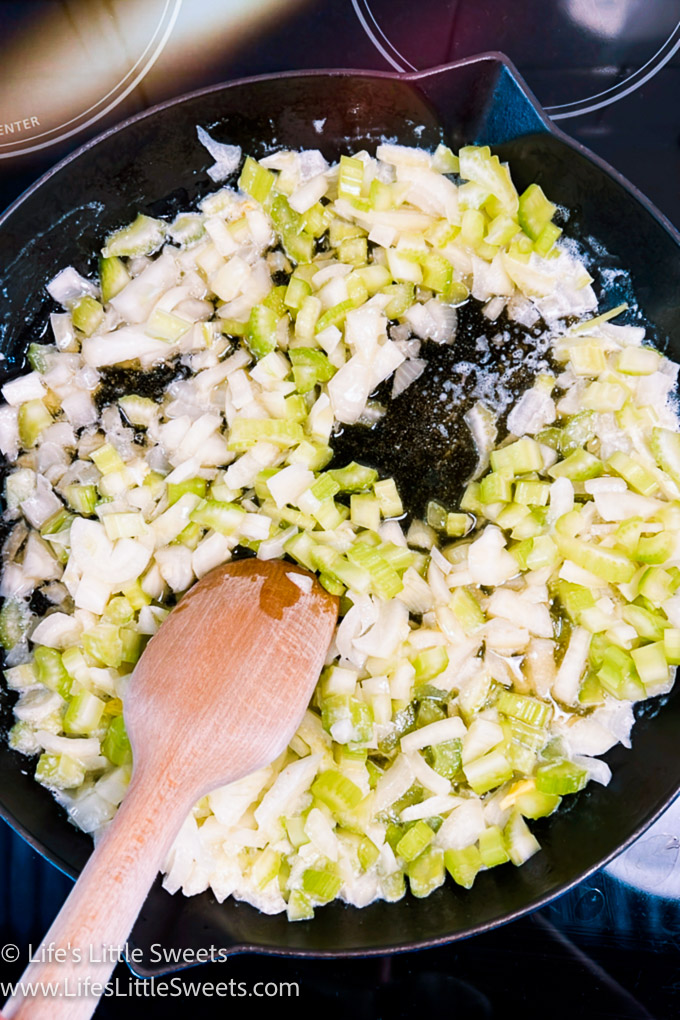 celery, butter and onions in a cast iron skillet for Stuffing Dressing Recipe