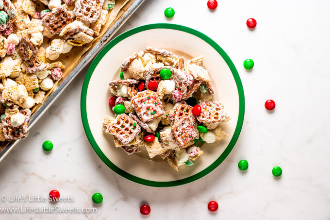 Holiday bait snack mix on a plate on a marble table