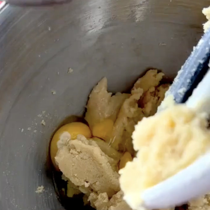 in a stand mixer, mixing butter and sugar
