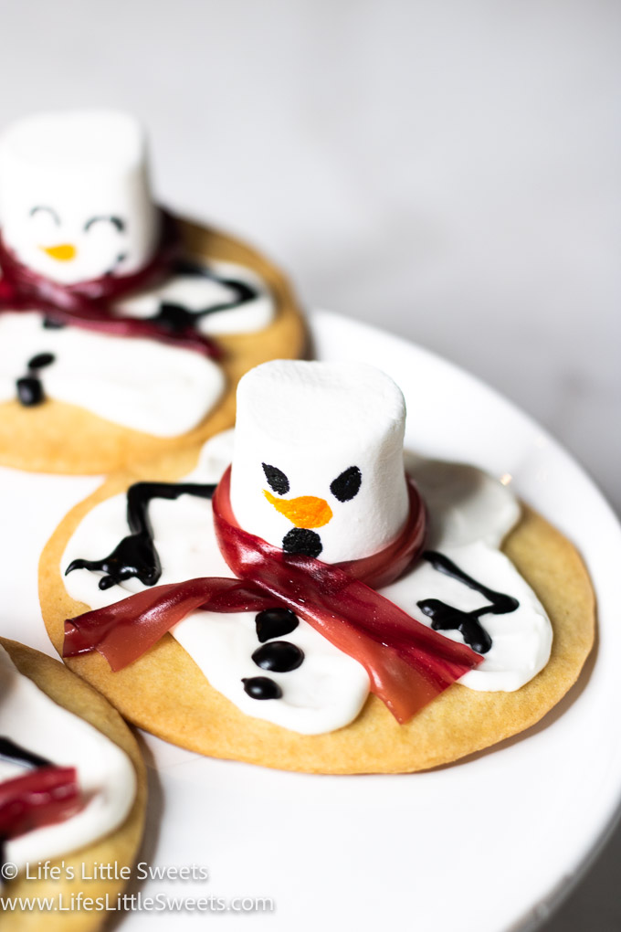 a sugar cookie decorated like a melting snowman