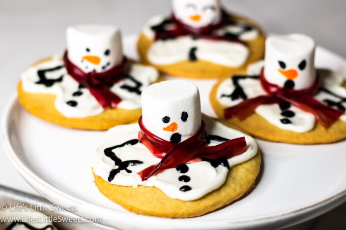 snowman cookies with red scarves