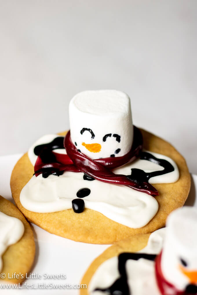 a cookie decorated as a melting snowman