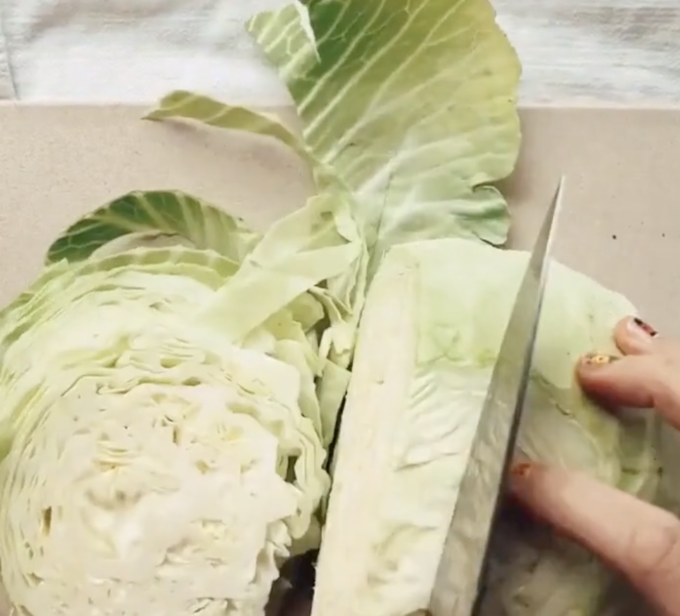 slicing green cabbage