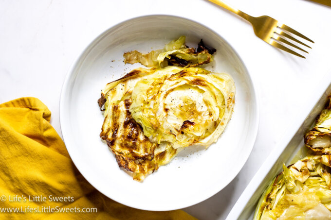 cooked cabbage with a gold fork and a white plate