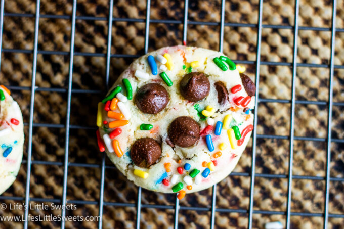 a funfetti cookie on a wire cooling rack 