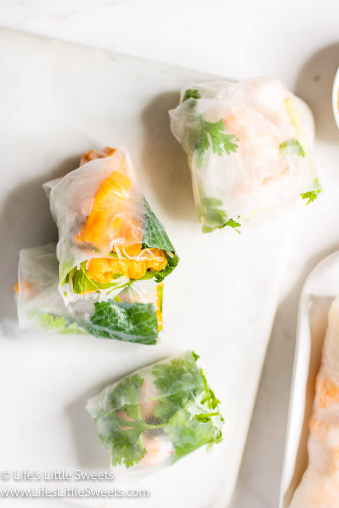 fresh spring rolls on a white marble surface