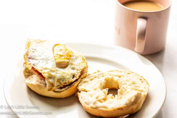 an open-faced pork roll sandwich with coffee