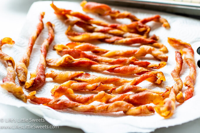 bacon cooling on paper towels