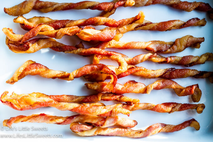 overhead view of bacon twists in a white dish