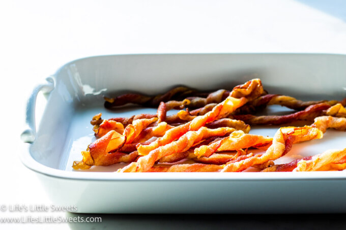 twisted bacon on a white serving platter