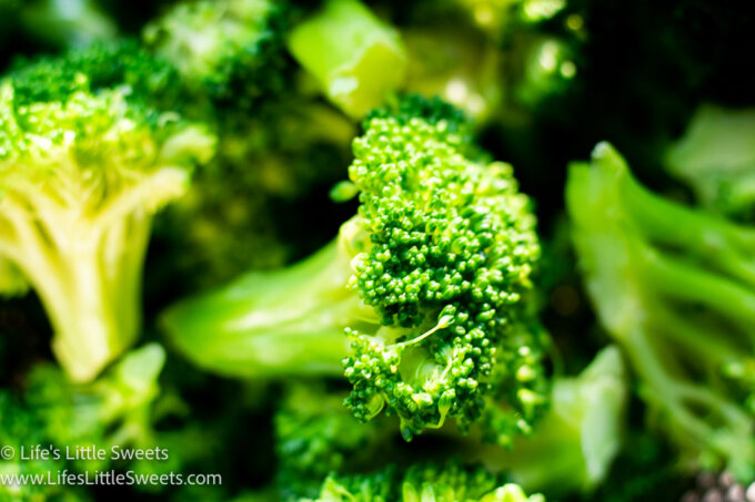 a close up of a green parboiled broccoli floret