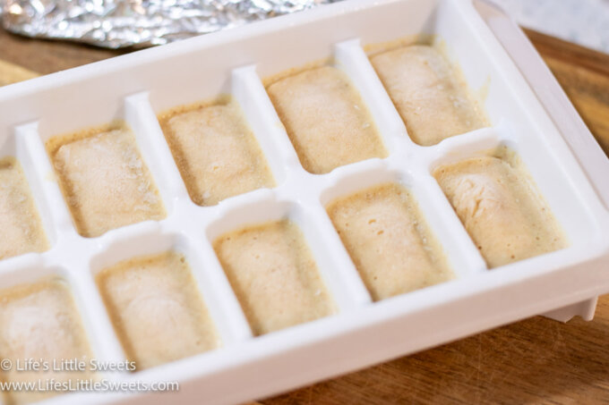 pancake batter in an ice cube tray