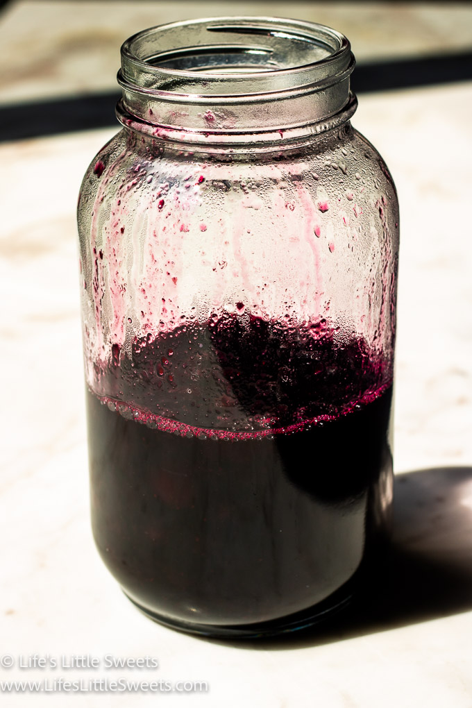 blueberry syrup in a large mason jar