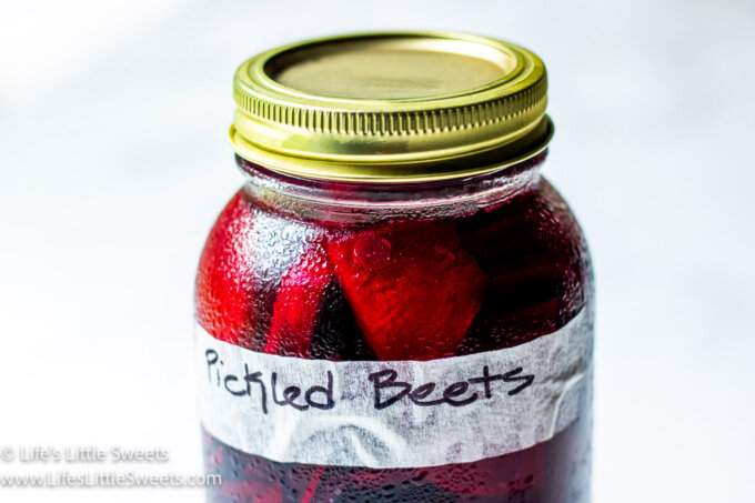 a jar of pickled beets with a label, saying, 