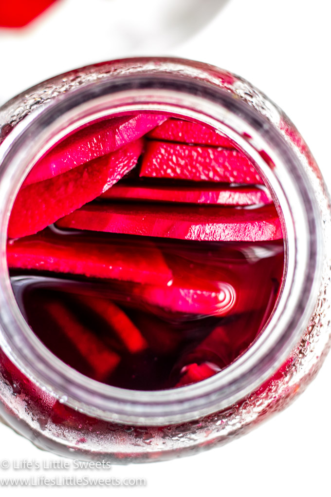 an open jar of pickled beets