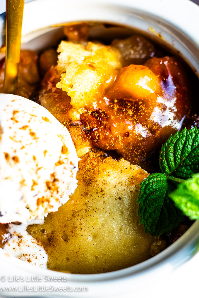 a bowl of Peach slump with fresh mint and ice cream