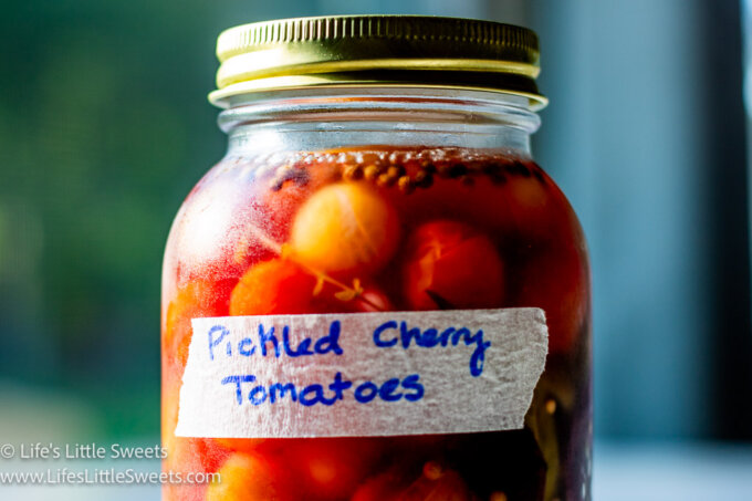 Pickled Tomatoes in a mason jar with a masking tape label