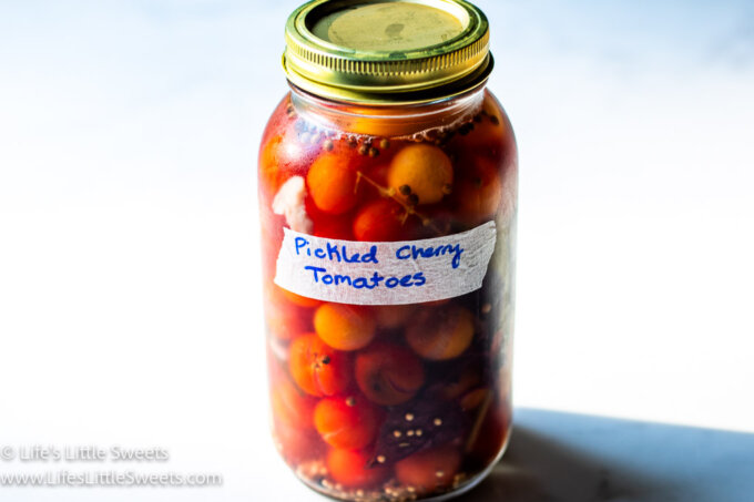 Pickled Tomatoes in a mason jar with a label