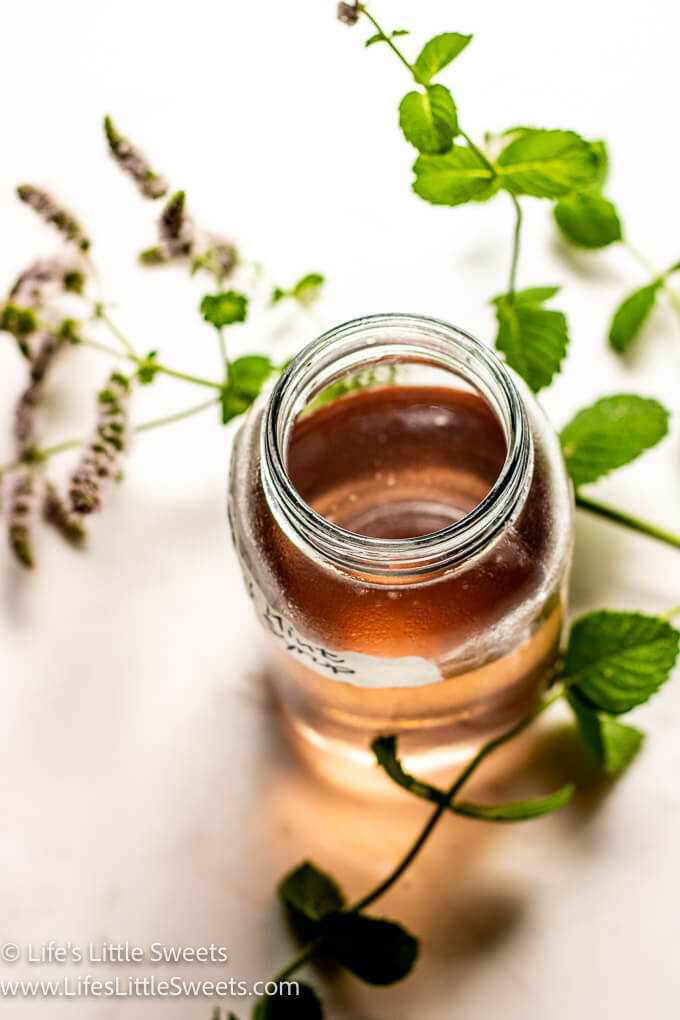 simple syrup in a mason jar with mint