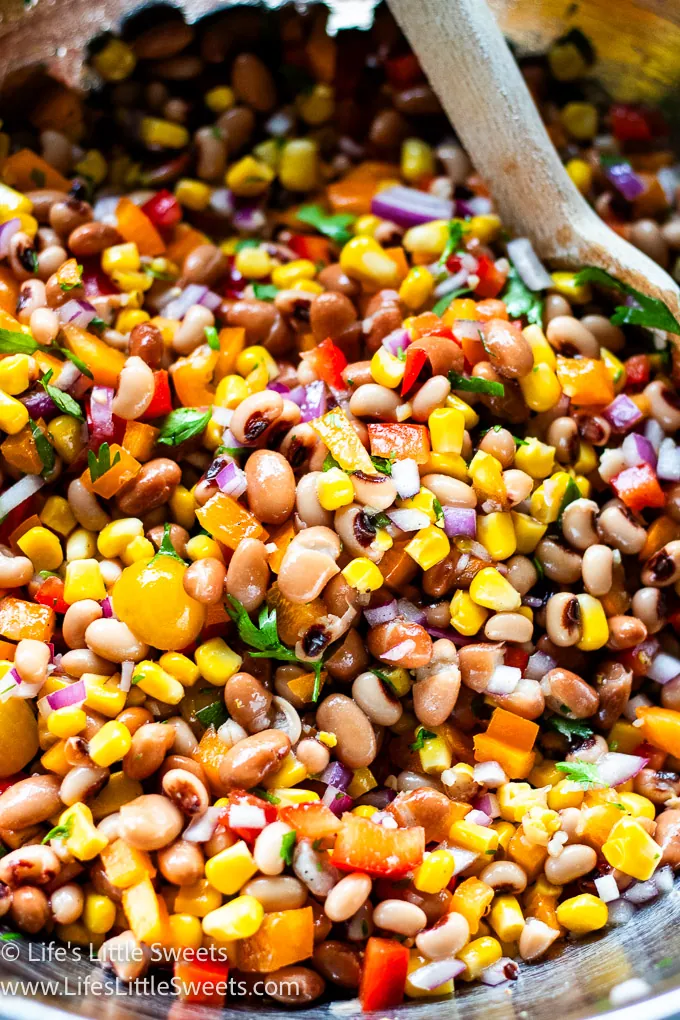 a metal mixing bowl with Cowboy Caviar in it