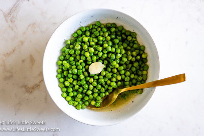Slow Cooker Crock Pot Butter Green Peas in a white bowl