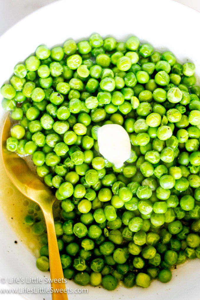 Slow Cooker Crock Pot Butter Green Peas with a pat of butter and a gold spoon