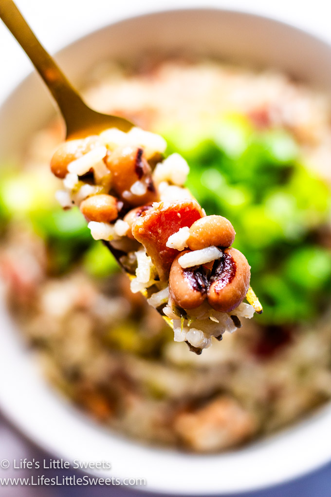 a gold fork filled with Hoppin' John