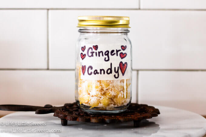 ginger candy in a mason jar with a hand-written label