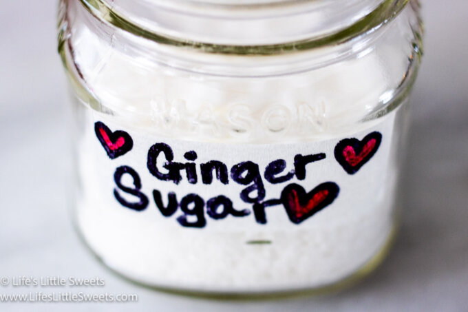 Ginger sugar in a jar that has a label that has red hearts